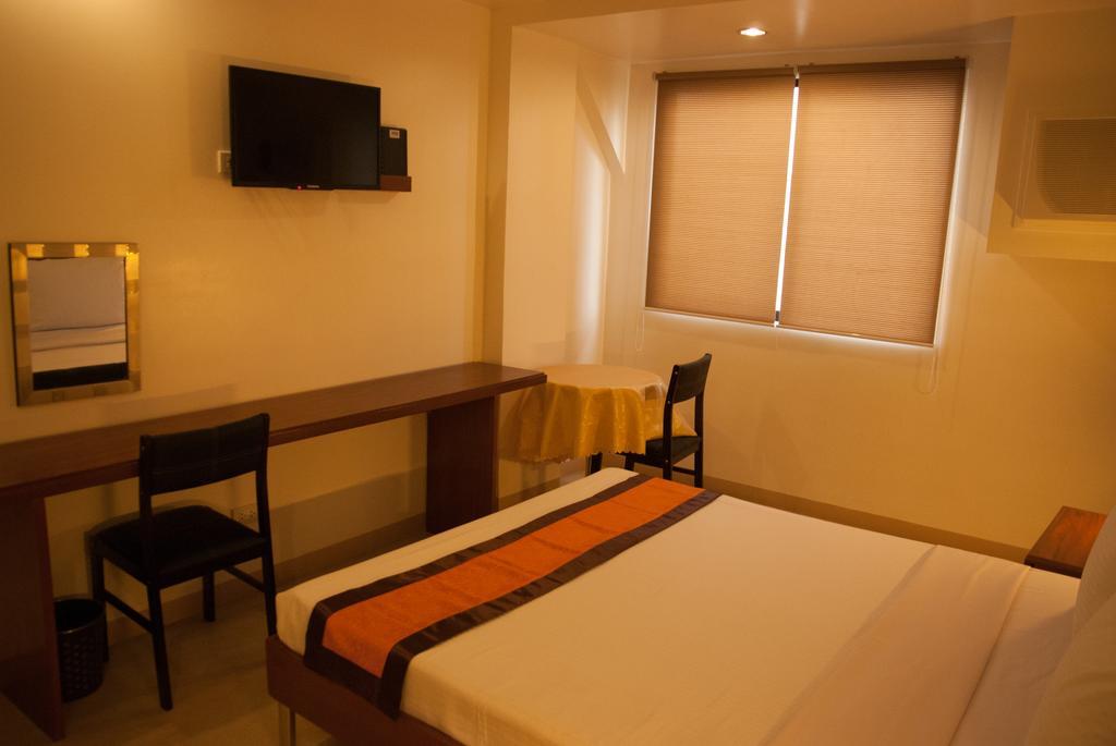 M Suites Hotel Makati City Pokoj fotografie