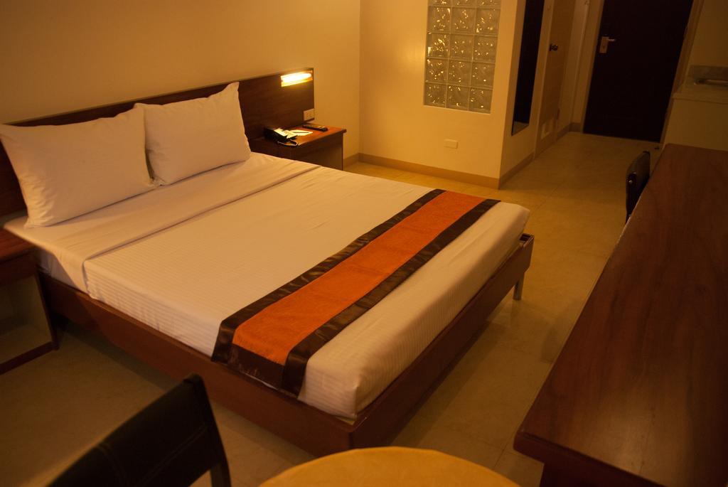 M Suites Hotel Makati City Pokoj fotografie